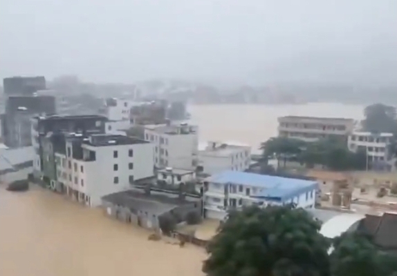 Continuous heavy rain in multiple parts of Guangdong causes flooding, one town in Zhaoqing submerged.