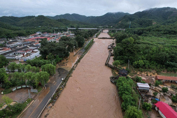 Photo story: Beijing flood causes significant casualties, houses and farmland washed away