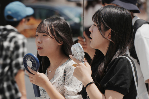 Japan’s temperature soars to 41.8 degrees Celsius, setting a new record high.
